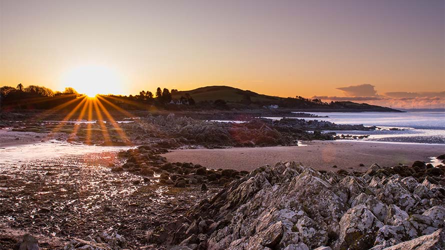 Sunset over Rockcliffe Bay Beach in Dumfries