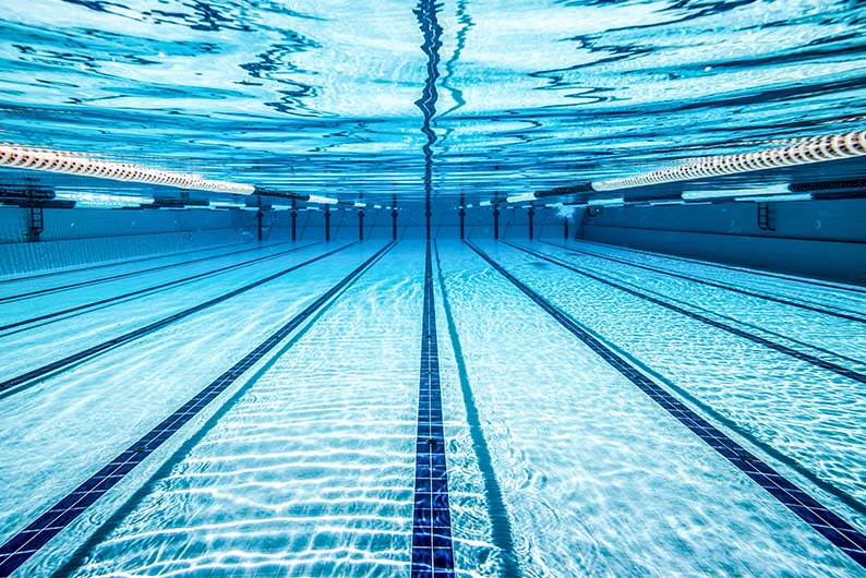 Underwater in an outdoor swimming pool