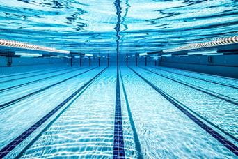 Underwater in an outdoor swimming pool
