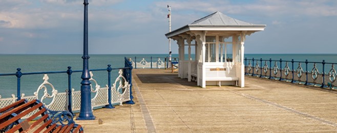 A seaside pier on a sunny day