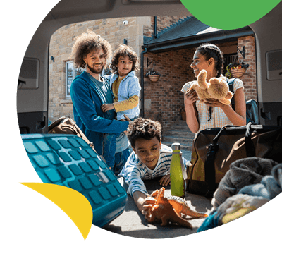 A family packing the car ready to head on a staycation