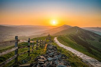 Sunrise over the Peak District hills