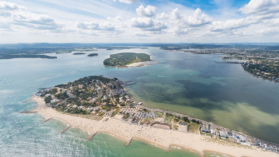 A view over Poole Harbour showing Sandbanks and Brownsea Island