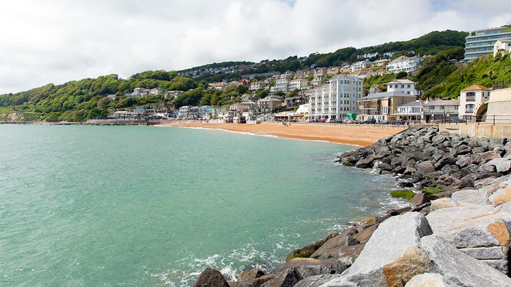A blue bay in front of sandy beach on the Isle of Wight