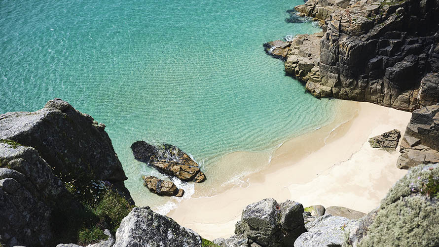 The impossibly clear waters of Pedn Vounder Beach revealed at low tide