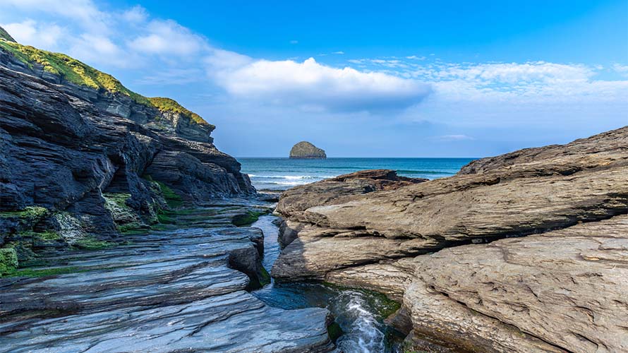 Rocks and tidal pools at Trebarwith Beach in Cornwall