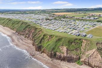 An aerial view over Crimdon Dene Holiday Park on the Durham coastline