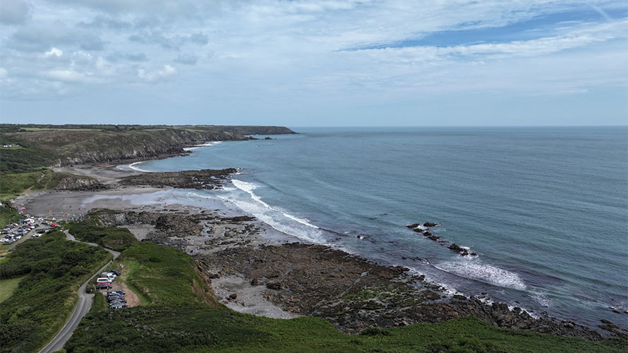 An aerial view over Kennack Sands and Lankidden Cove on the Lizard in Cornwall