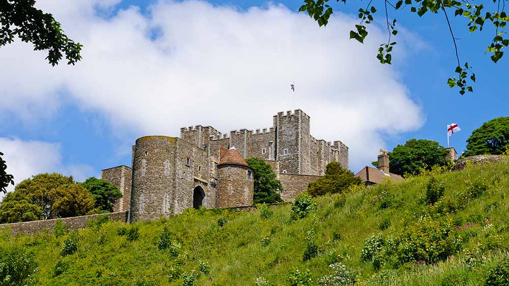 Dover Castle sitting atop a grassy hill
