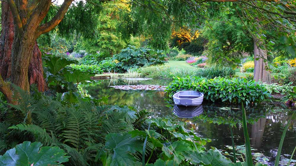 A beautiful secluded rowing lake in a landscaped garden
