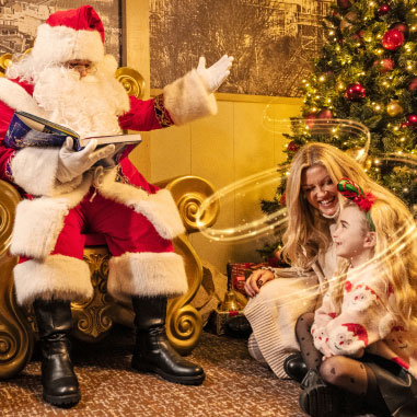 Santa with mum and daughter