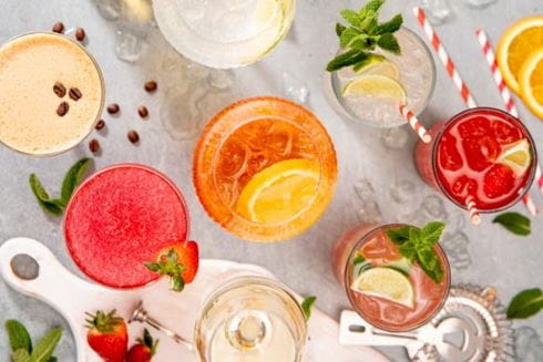 Cocktails with colourful stripy straws