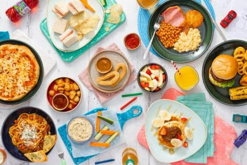 Colourful food shot showing pancakes and churros