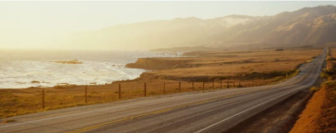 A coastal road at sunset