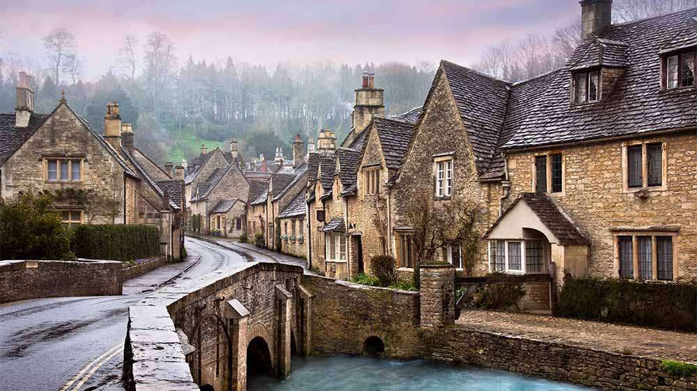 Stone cottages in Castle Combe on an autumn day