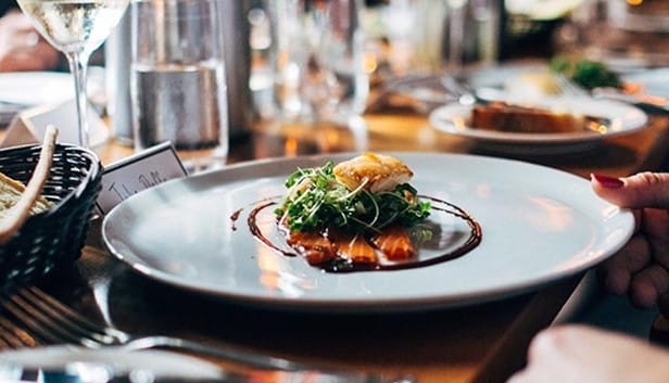 A meal being served fine dining style