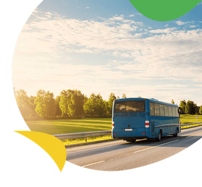 A bus driving along a country road