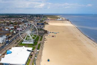 An aerial view over Great Yarmouth's promenade and beach
