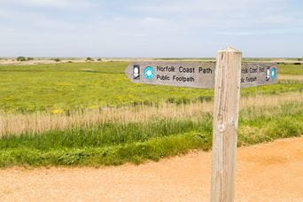 A sign for walkers along the Norfolk Coast Path