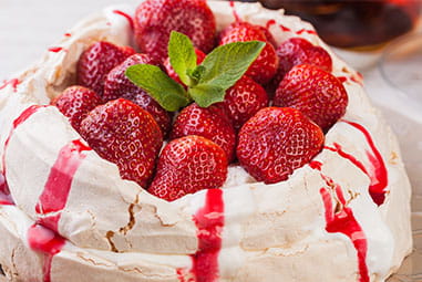 A homemade strawberry pavlova