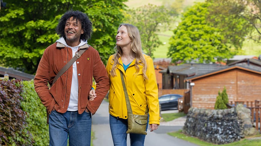 A couple heading out for a walk while on holiday