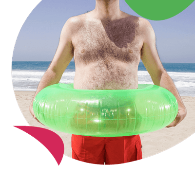 A man at the beach with a ringo