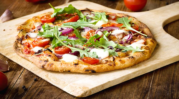 Pizza on a wooden board