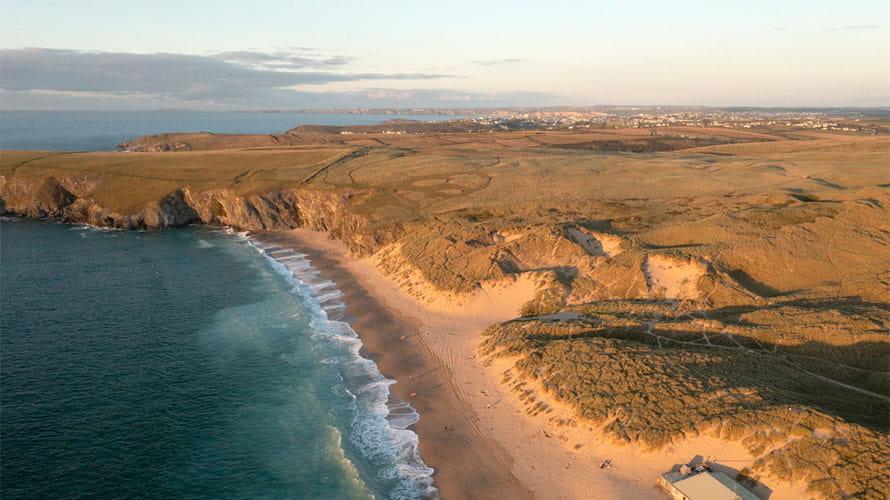 A view over a beach and headland on the Cornwall coast