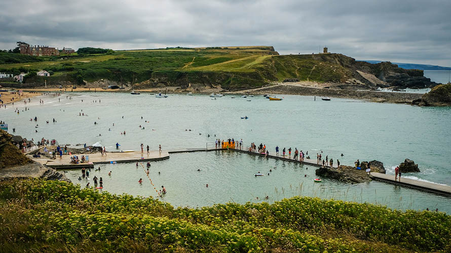 Swimmers enjoying a dip in Bude Sea Pool on Bude's waterfront
