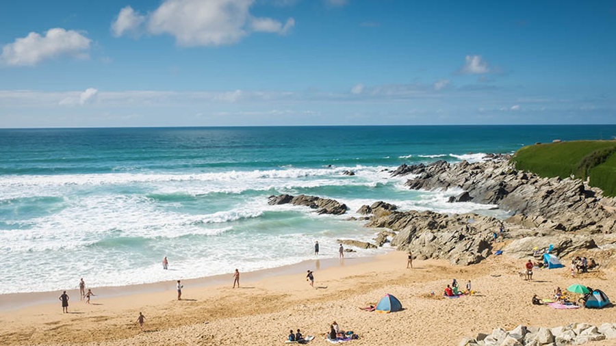 Families on the north end of Fistral Beach in Cornwall