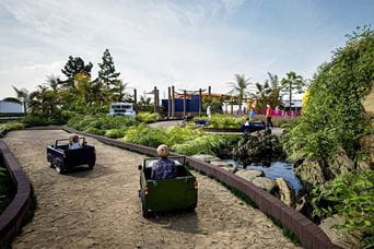 Kids driving on the new off-road rangers course at Vauxhall Holiday Park in Norfolk