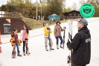 A skiing lesson on the dry ski slope at Warmwell Holiday Park