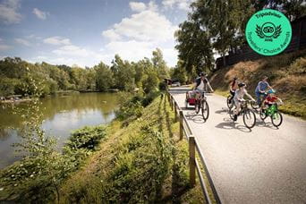A family cycling around Warmwell Holiday Park in Dorset