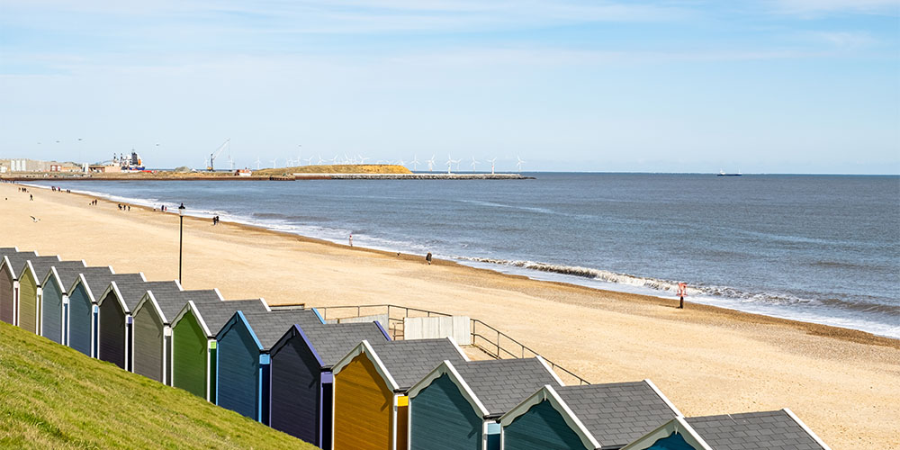 Beach huts lining Gorleston Beach