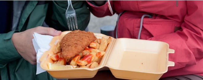 Eating fish and chips on the beach