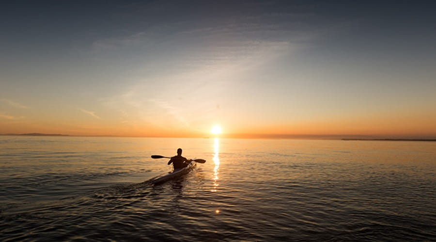 Canoeing into the sunset