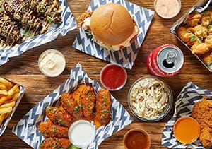 food laid out on a table from Thunderbird Fried Chicken