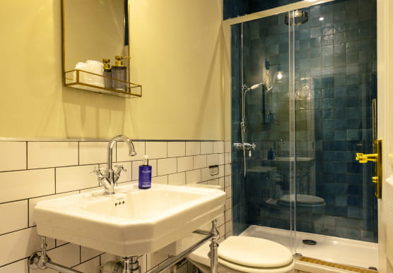 Stylish bathroom with white subway tiles