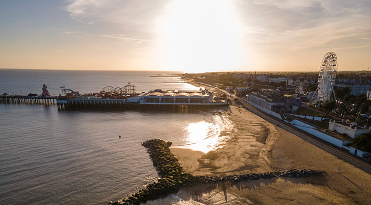An aerial view of a sunset over Walton Pier in Essex