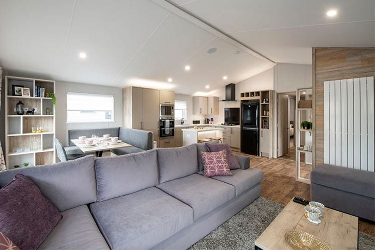 A spacious living room in a new lodge