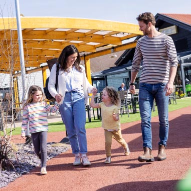 Family walking hand in hand