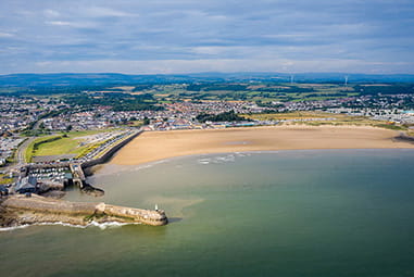 An aerial view over Porthcawl's beaches in South Wales