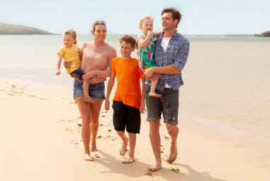 family together on a beach