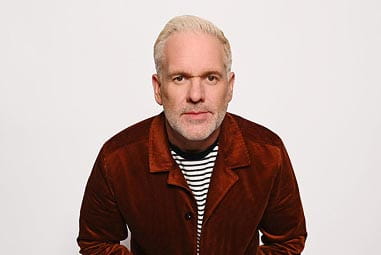 Chris Moyles in a red jacket