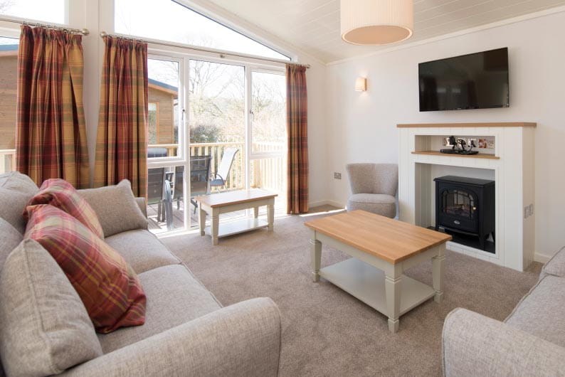 Interior living room shot of lodge at Parkdean Resorts