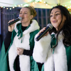 two women singing