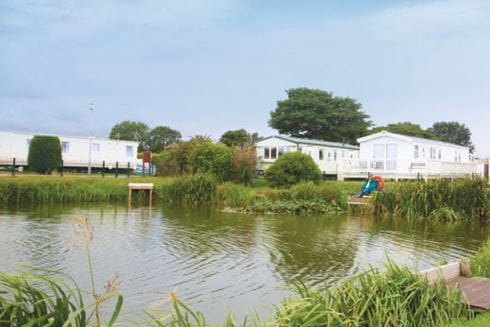 caravans overlooking a lake