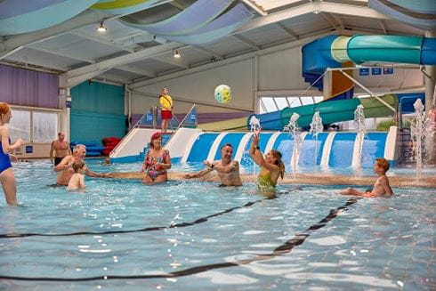 Family in swimming pool
