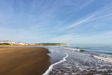 Sandown Beach, with deep blue sky and waters