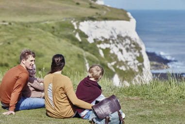 family enjoying a picnic on the White Cliffs of Dover